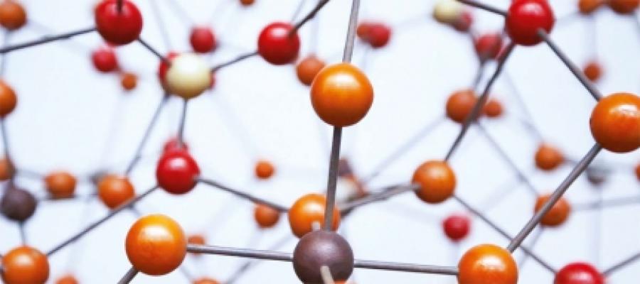 A molecular model of red and white wooden balls